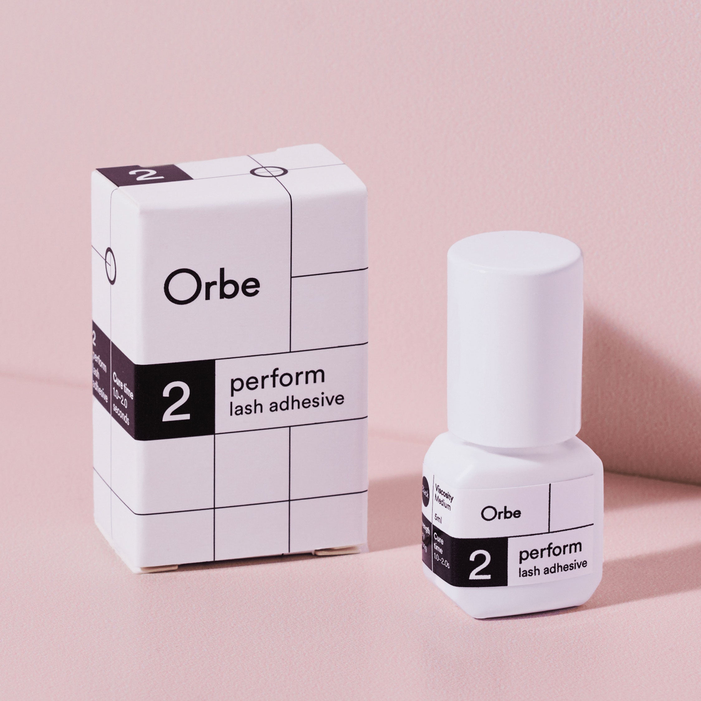 Orbe Perform 2 eyelash glue with box. A PureForm® adhesive